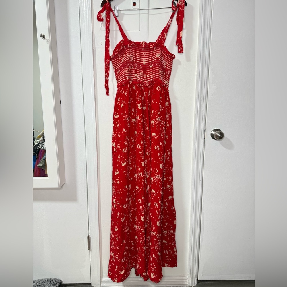 FREE PEOPLE red floral print wide leg shoulder tie jumpsuit, size S